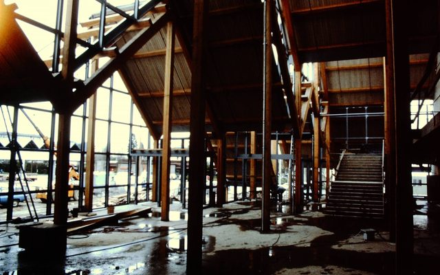 Inside of Hult Center lobby flooded with water and under construction.