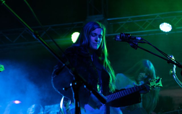 Image of musicians performing on stage