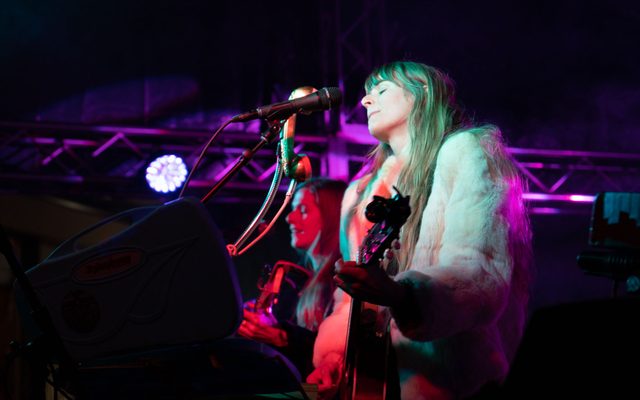 Image of musicians performing on stage