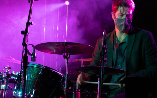 Image of musicians performing on stage