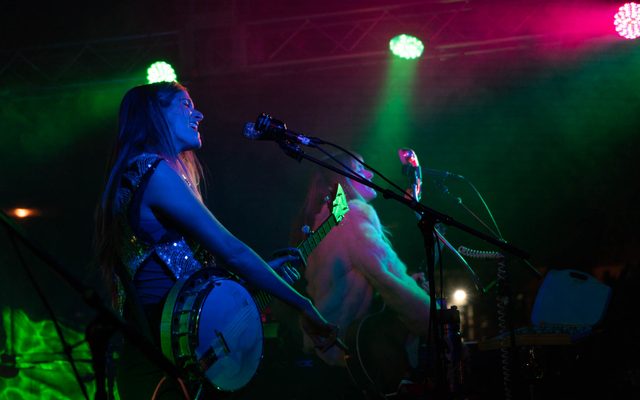 Image of musicians performing on stage