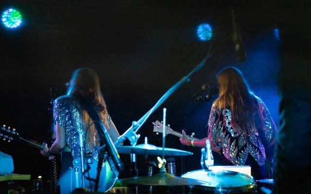 Image of musicians performing on stage