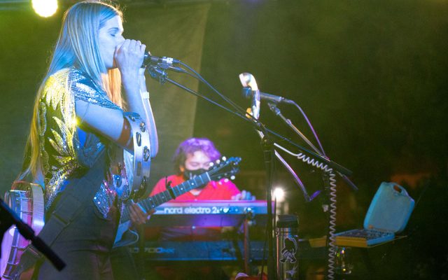 Image of musicians performing on stage