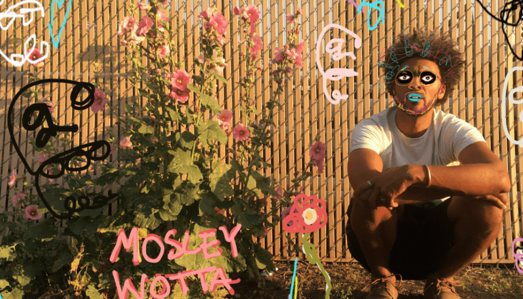 Mosley Wotta squatting outside