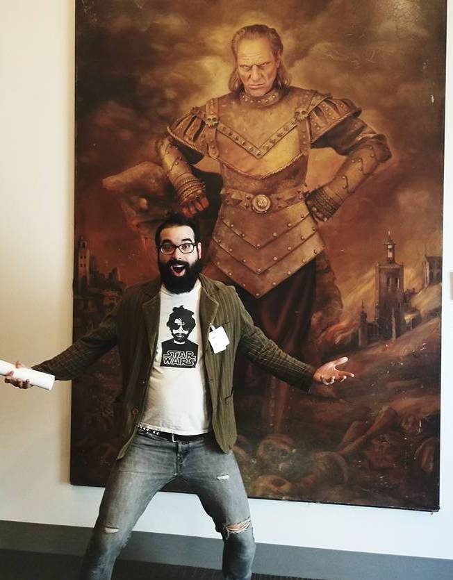 Photo of man with Star Wars memorabilia