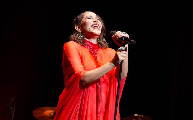 Woman holding a microphone