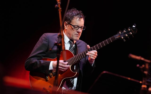 Man playing a guitar