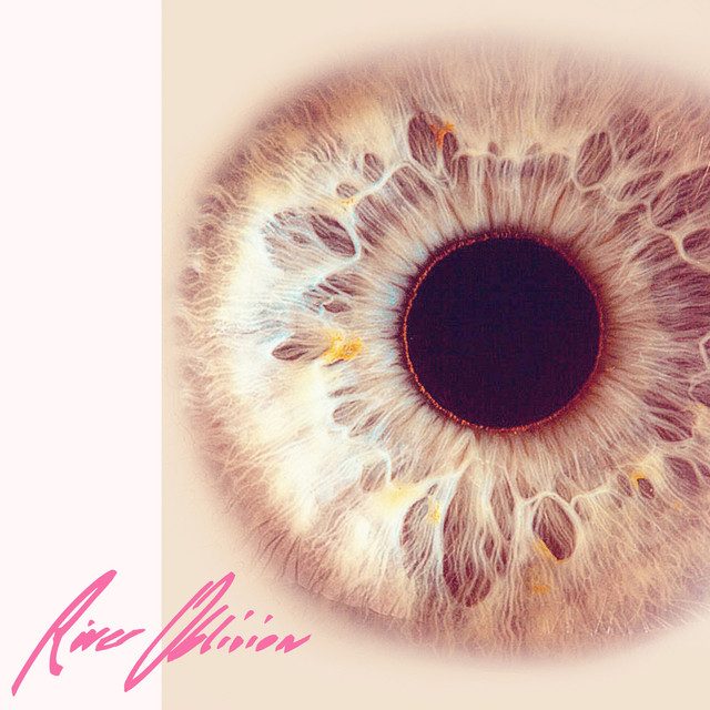 A digital upclose image of an eye in various pastel shades except for the center in dark red
